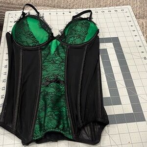 EUC emerald green with black lace and bows. Size S.